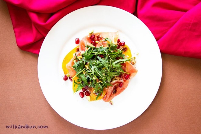 ProsciuttoSalad with persimmon and pomegranate seeds